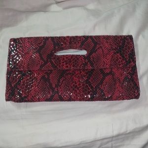 HOBO International snake print clutch